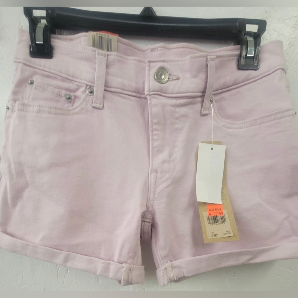 Baby pink Levi’s denim shorts. Size 2